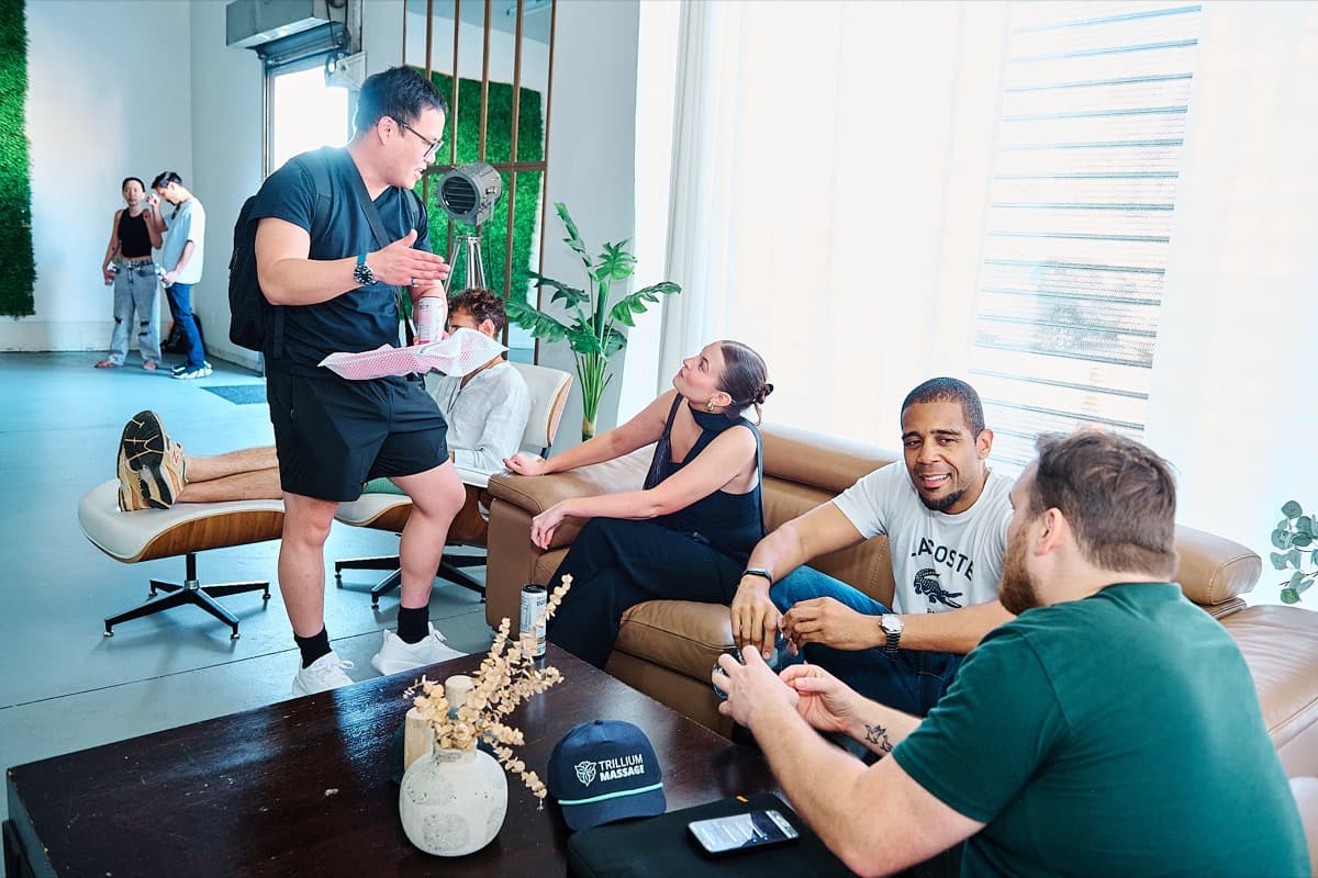 Group laughing together on a couch