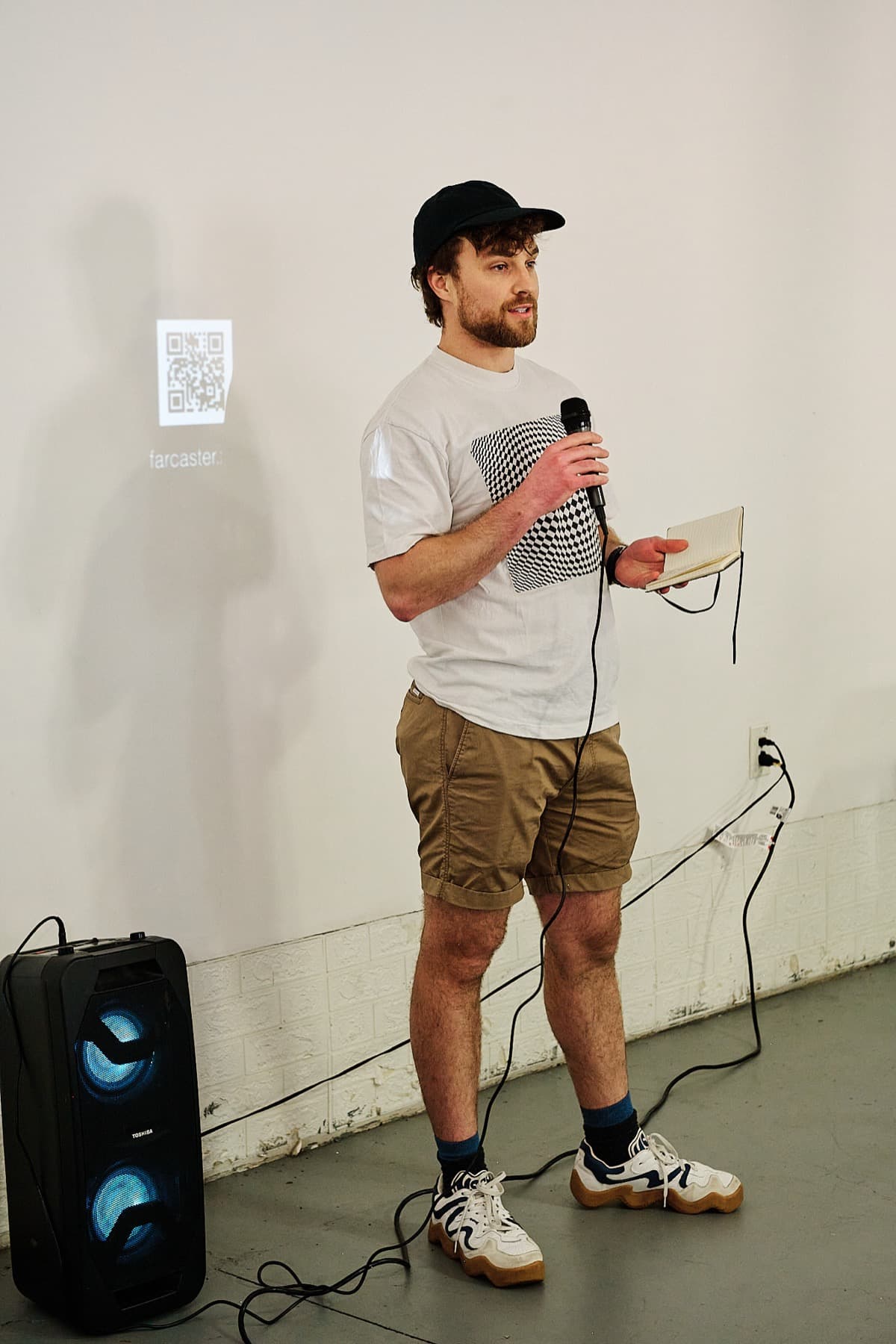 Speaker presenting with a microphone